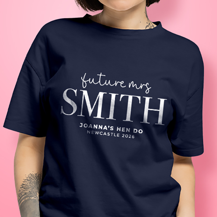 A blue and pink t-shirt with editable text that reads Bride Squad, Anna’s Hen Do, Marbella 2026