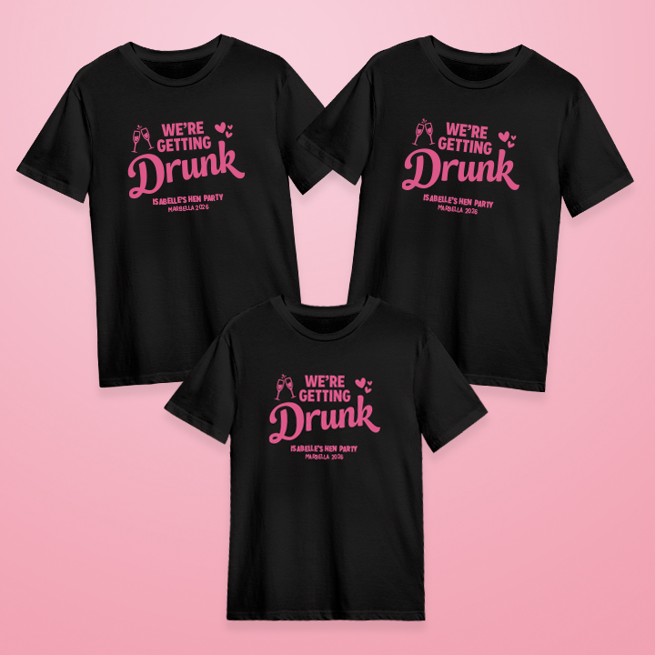 Three black custom hen do t shirts with editable text that reads We're getting drunk, Isabelle's Hen Party, Marbella 2026