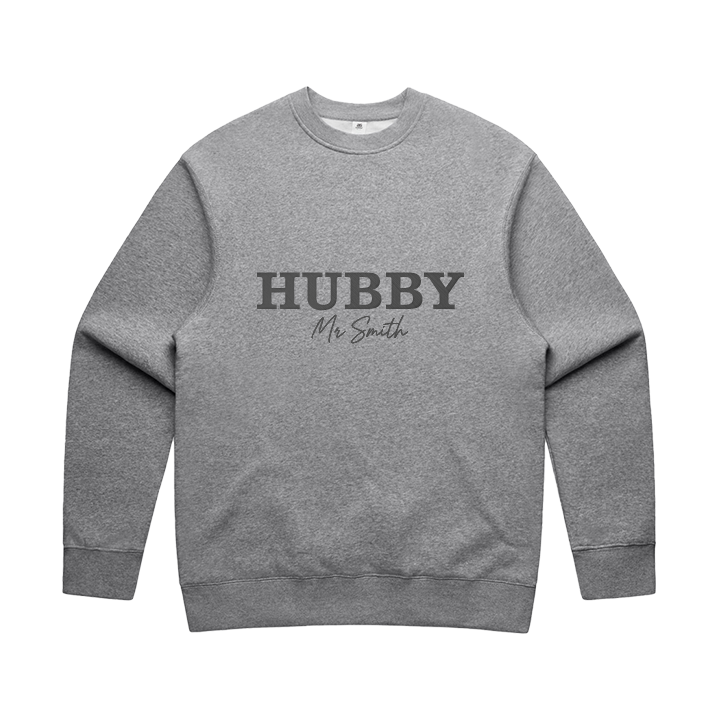 A luxe athletic heather coloured groom honeymoon sweatshirt that has HUBBY and Mr Smith underneath it in custom embroidered text 