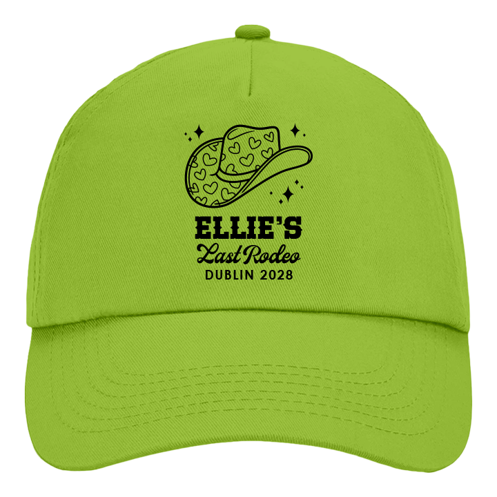 A custom hen do cap which is green coloured with a design of a black cowgirl hat with the custom text Ellie's Last Rodeo Dublin 2028