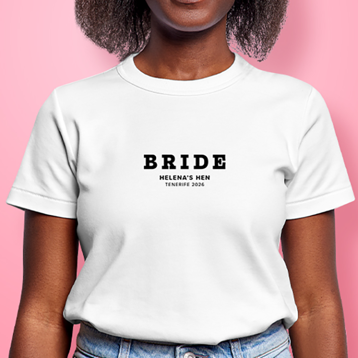 A white hen do t shirt that reads Bride in a subtle font with Helena's Hen Tenerife 2026 underneath it