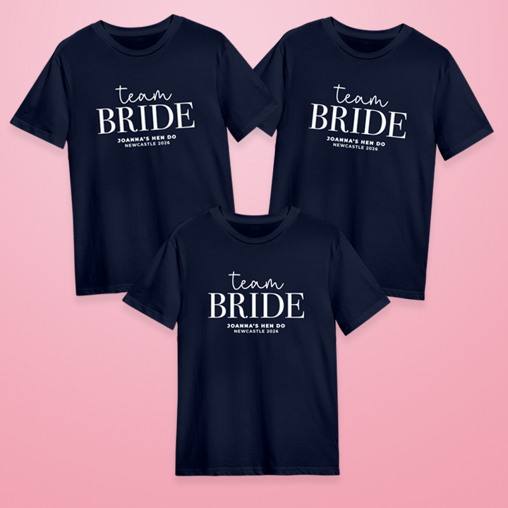 Three dark blue custom hen do t shirts that read Team Bride, Joanna's Hen Do, Newcastle 2026