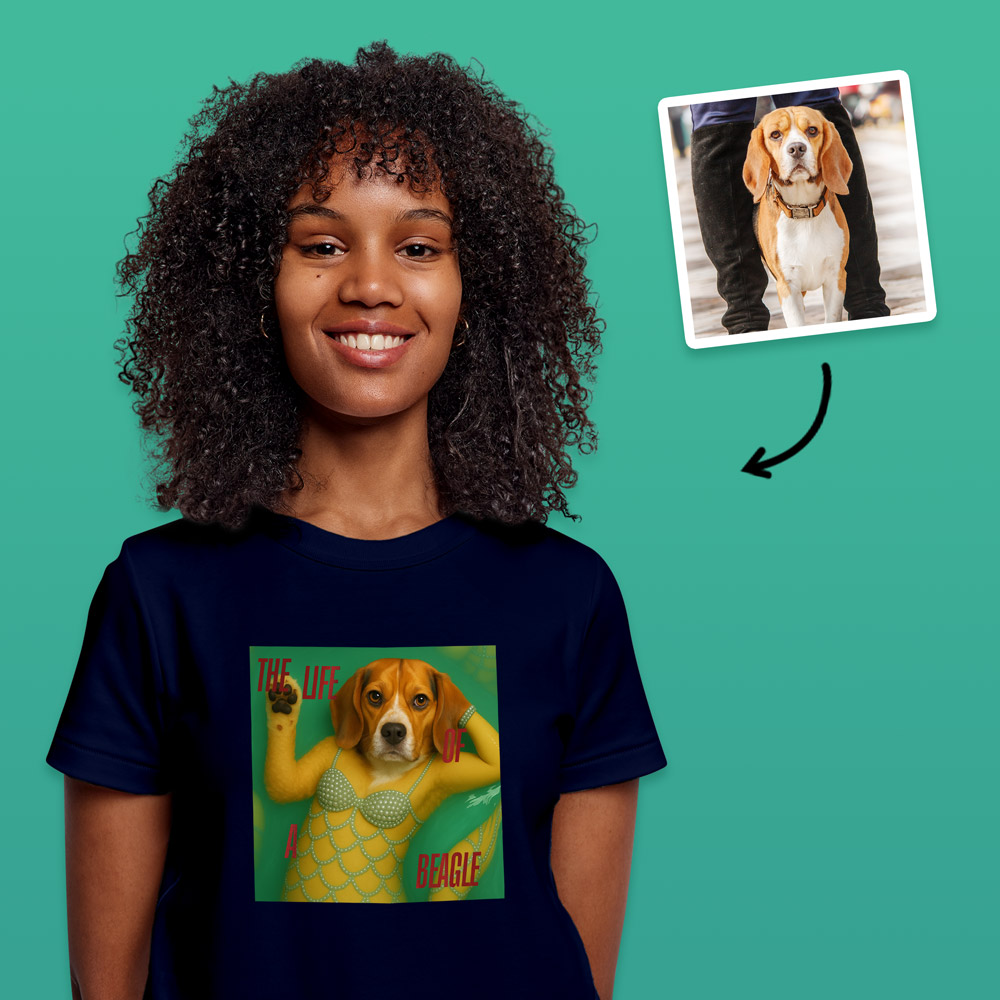 A blue Taylor Swift inspired t shirt that can have a photo of your pet added to it so it looks like they are a part of the Life of a Showgirl album, which has a beagle on it and text reading the life of a beagle