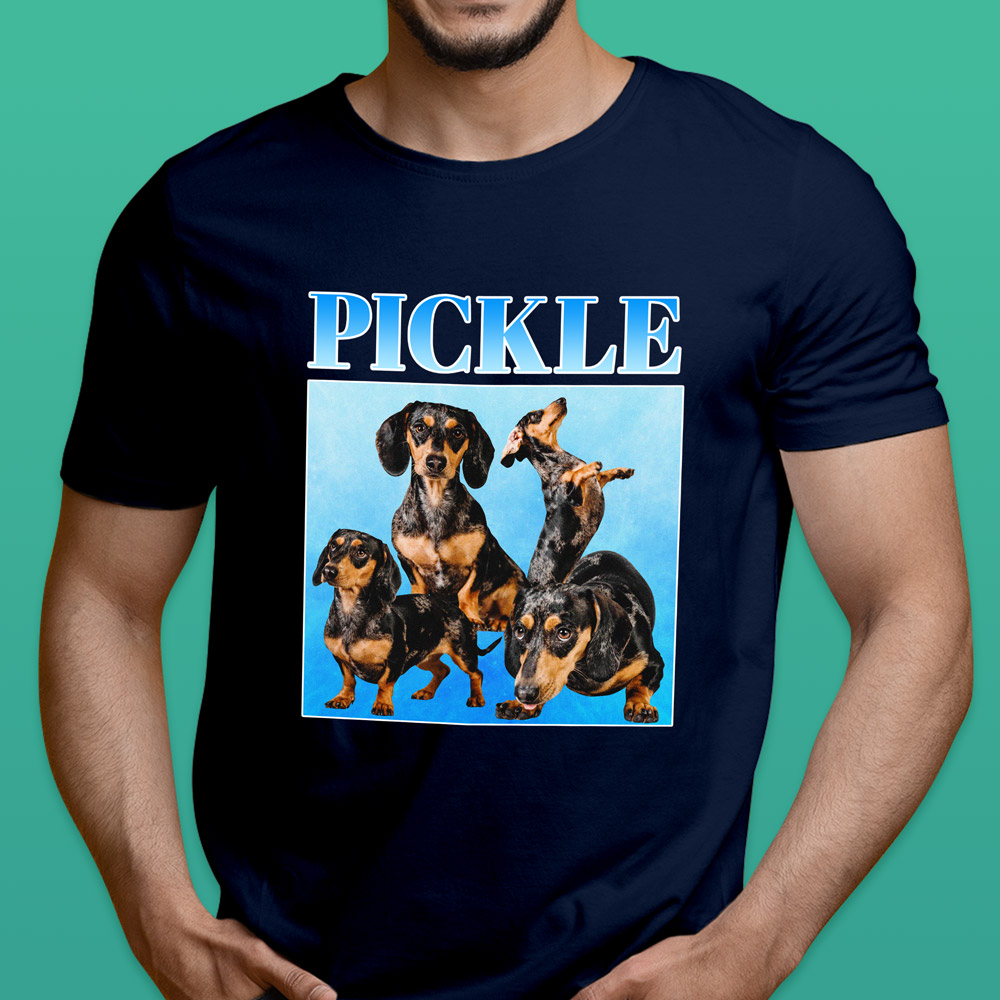 A male model wearing a custom pet t shirt with a bootleg-style design that has the same Dachshund on it four times with custom text reading Pickle 