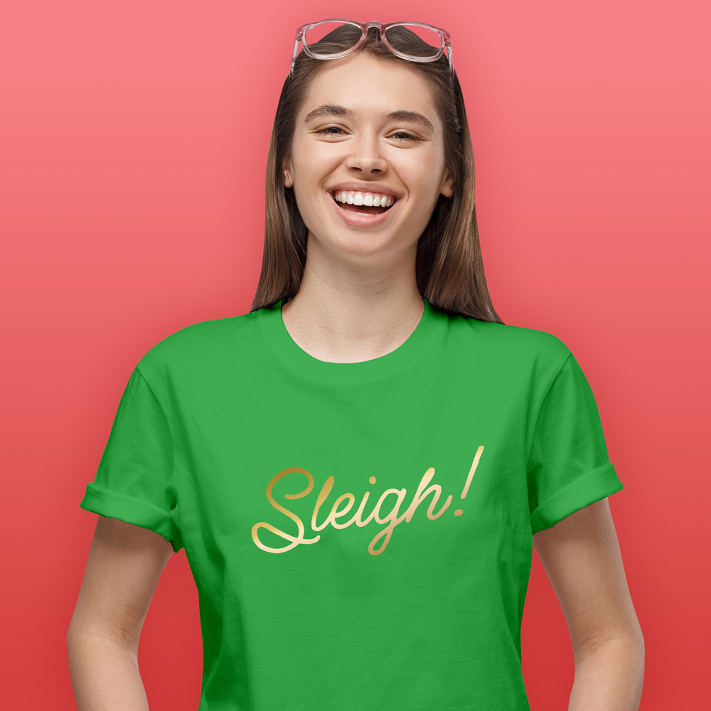 A green Christmas t shirt that has had the word 
