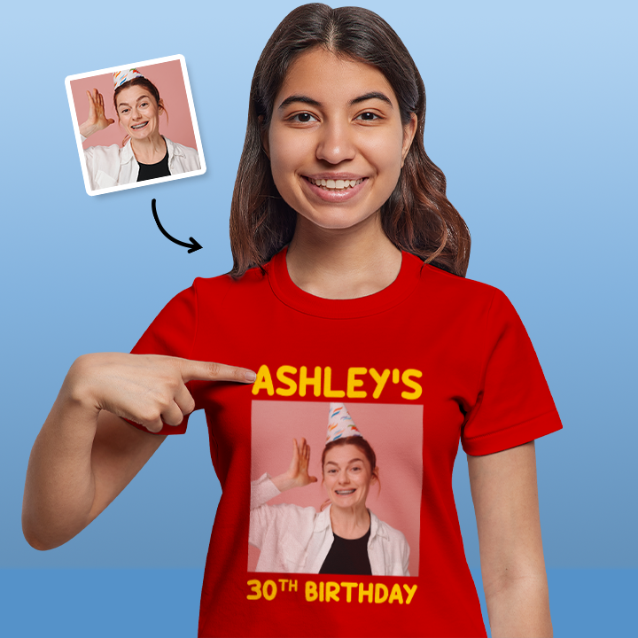 A female model wearing a custom birthday shirt that has had a photograph of a woman in a party hat added to it with the custom text Ashley's 30th Birthday 