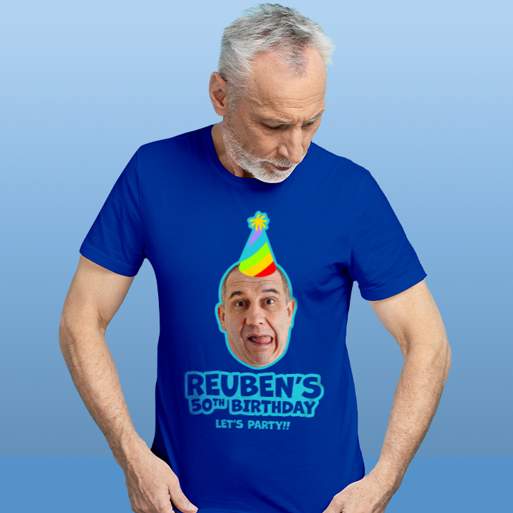A male model wearing a custom 40th birthday shirt where you can add a person's picture so it looks like they're wearing a rainbow coloured party hat, as well as custom text 
