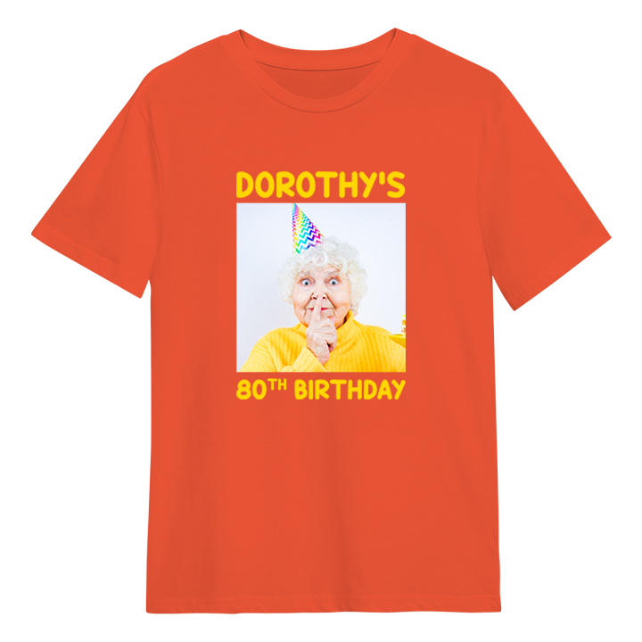 A custom birthday shirt that has had a photograph of a woman in a party hat added to it with the custom text Dorothy's 80th birthday