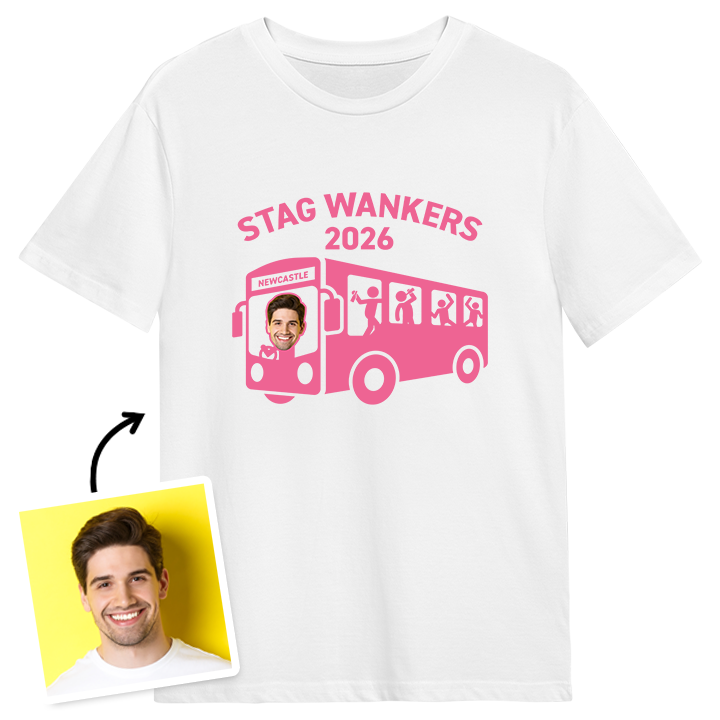 A white stag do t shirt that has a pink Inbetweeners bus wankers themed design that reads Stag Wankers 2026 with a man's face edited onto the t shirt to make it look like he's driving the bus