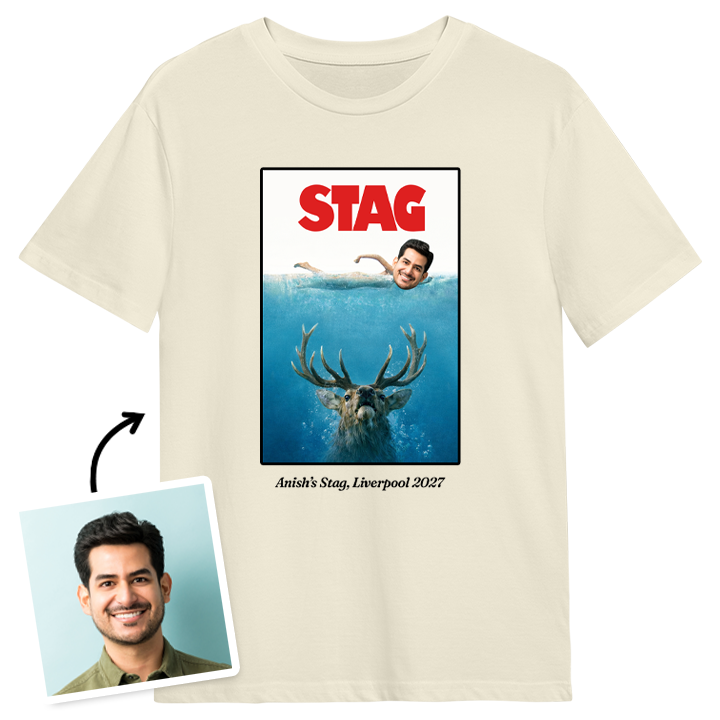 A custom stag do t-shirt inspired by the Jaws poster which reads Stag and has a man with an editable face swimming above a stag and custom text that reads Anish's Stag Liverpool 2027