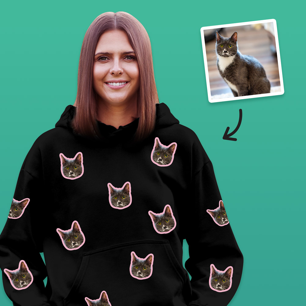 A custom pet hoodie that has space for multiple faces of your pet all over the shirt, this one has a black and white cat all over the hoodie