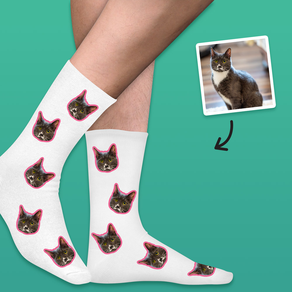 A custom pair of pet socks that has space for multiple faces of your pet all over the socks, this pair of socks has cats on them