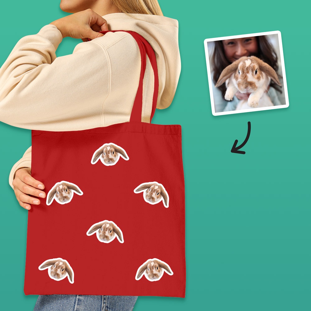 A custom pet tote bag that has space for multiple faces of your pet all over the bag, this one has rabbits on it 