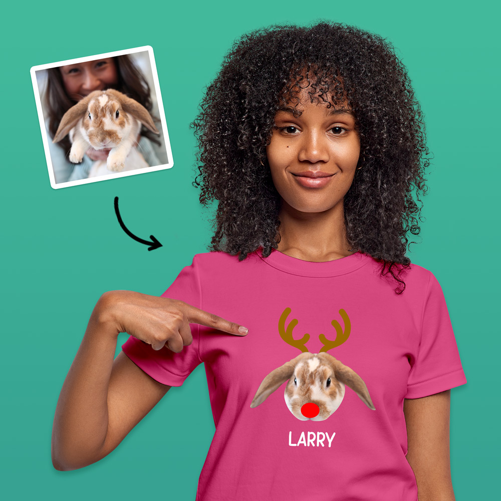 A custom pet t-shirt that has been personalised with a rabbit's face wearing antlers and a red nose like Rudolph alongside custom text reading Larry