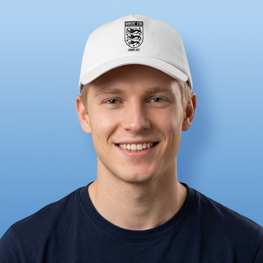 A male model wearing a white custom stag do football-themed cap with the England logo and custom text reading Marcus' Stag London 2027