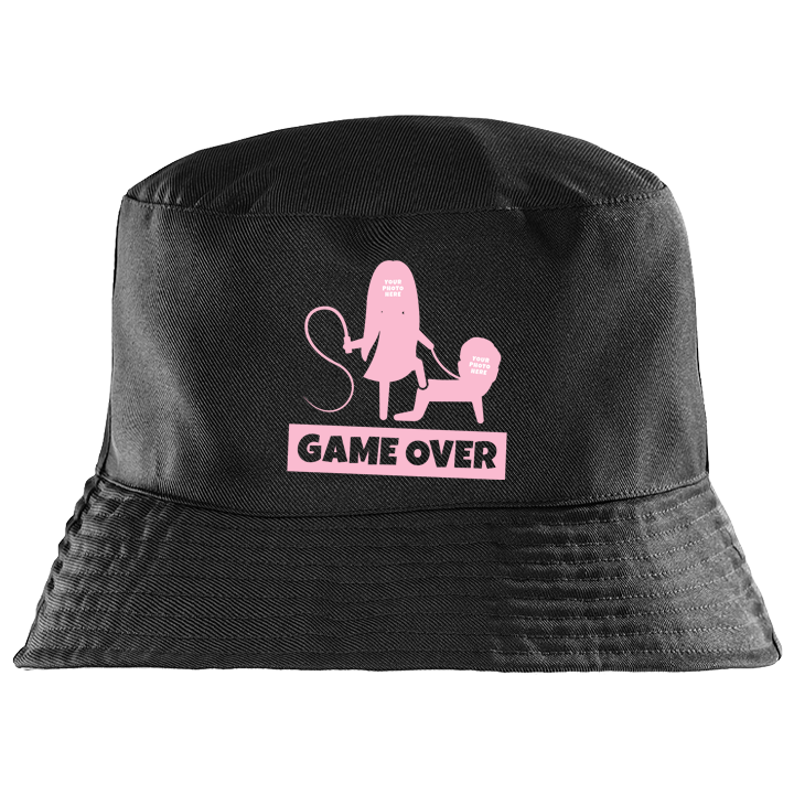 A black custom stag do bucket hat where you can upload two face pics to make it look like the stag is being whipped by his partner with the text Game Over 