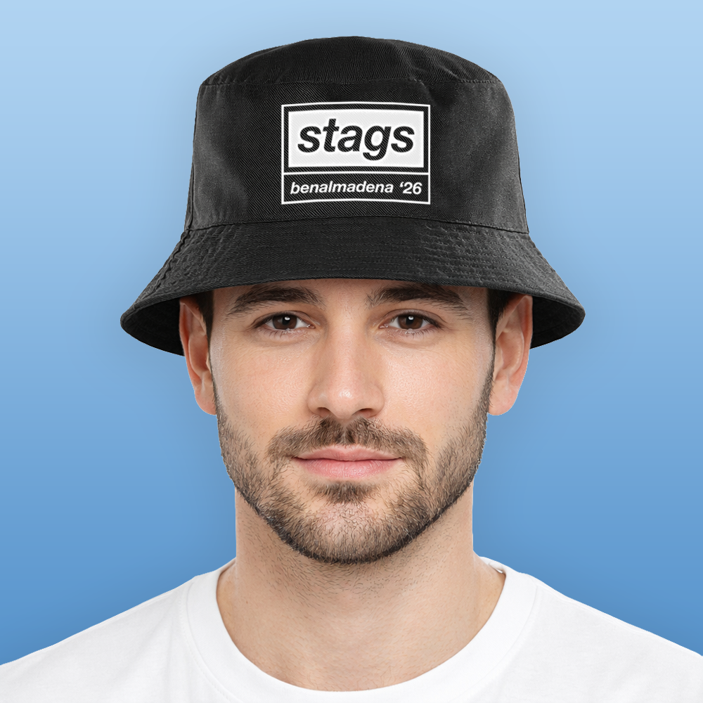 A male model wearing a black Oasis style custom bucket hat that reads stags benalmadena '26 in the style of the Oasis logo 