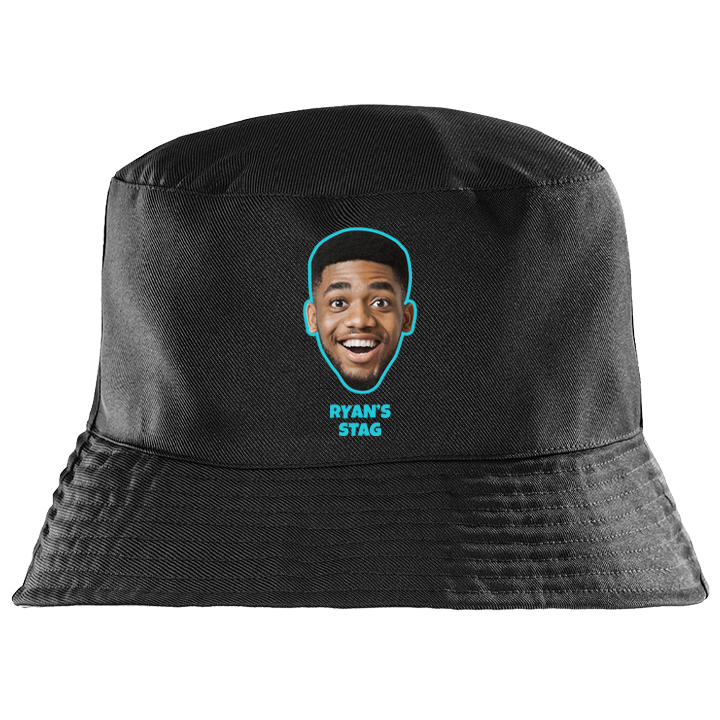A custom black bucket hat that has been personalised with a man's face and custom text reading Ryan's Stag 