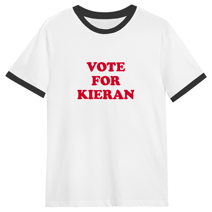 A Napoleon Dynamite inspired customisable stag do t shirt that reads vote for Kieran in red writing in the style of Vote Pedro