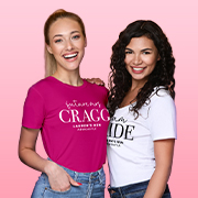 Two women wearing customised hen do t-shirts