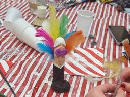 A decorated clay willy at a Willy Workshop