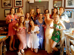 A group of women holding up their handmade Nipple Tassels
