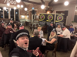 Host taking a picture with the group