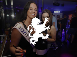 Two girls posing with drinks in hand and the Linekers logo overlayed