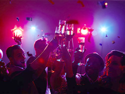 A cocktail bar under disco lights