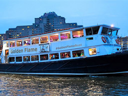 The London Party Boat Cruise on the river at dusk