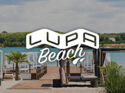 The sea front with sun loungers and beds at Lupa Beach Club in Budapest
