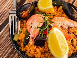 A close up of a paella dish at a cooking class in Madrid
