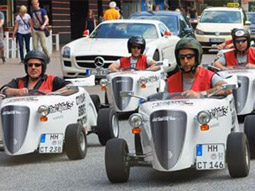 People racing around in hot rods in Bucharest
