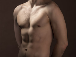 The torso of a male stripper in Lisbon