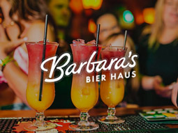 Three cocktails on the bar at Barbara's Bier Haus