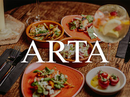 A table with various dishes on at Arta in Glasgow