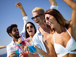 A group of people dancing on a party boat in Split 