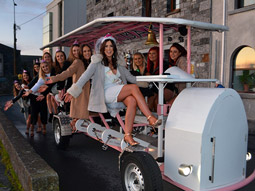 A group of hens on a pedal bus tour in Galway