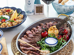 A selection of food laid out on a table 