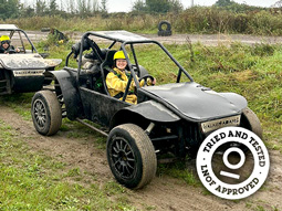 A man driving a rage buggy