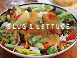 A top-down view of two large plates of food 