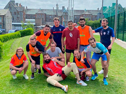 A group of people with Gaelic Game outfits on