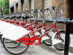 Line of red bikes parked up