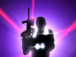 A silhouette of a man playing laser quest 