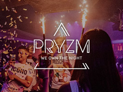 Someone carrying through alcohol with sparklers coming out of them at PRYZM