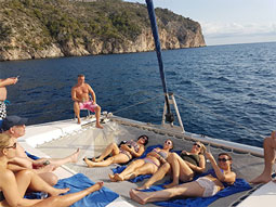 Lots of people on a private catamaran charter in Magaluf