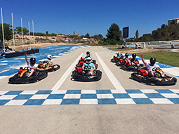 People in go karts waiting in front of a start line in Benidorm 