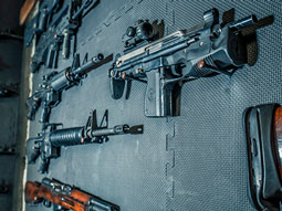 A gun mounted on a wall