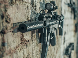 A gun mounted on a wall