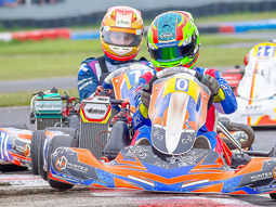 Two people racing on an outdoor track at Grand Prix in Newcastle